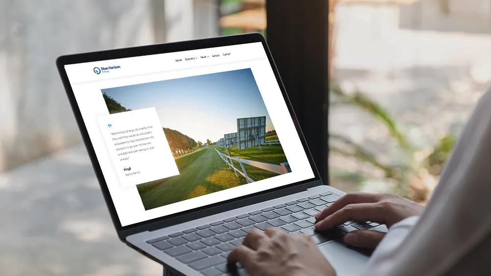 Laptop displaying the Blue Horizon website homepage, developed by LXE Digital for a renewable energy company based in Minnesota